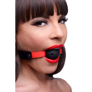 This perforated ball gag allows them to breathe easily while having their speech restricted. The ball is firm