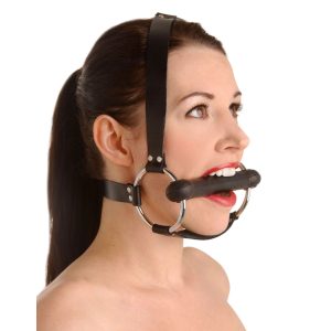 Saddle up With this Locking Trainer Gag made from silicone. This gag is perfect for those into pony play. This gag has a chin strap for extra support as well as straps that go behind and over the head. There are two locking buckles in the back to make sure your little pony does not run off. Once your sub is strapped in they will find this gag to be very comfortable and since the gag is made from silicone it has no odor or taste. Locks are not included with gag.