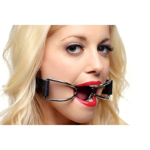 This gag leaves your partner speech-less while still having access to their mouth as it remains open The gag will remain securely around their head with the belt style buckle. Because the strap is adjustable