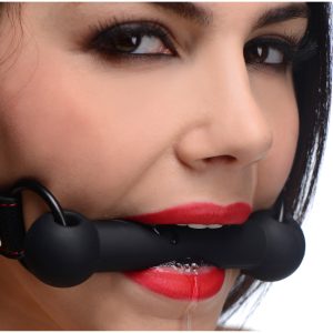 Strap your pet into this attractive and comfortable bit gag to subdue them during your play sessions. With a classic design and bold red stitching against the leather-like material